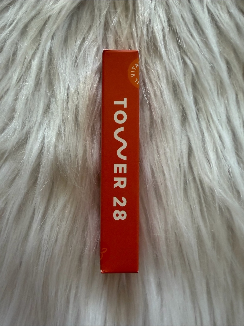 Tower 28 Lip Gloss / Balm in Orange Packaging